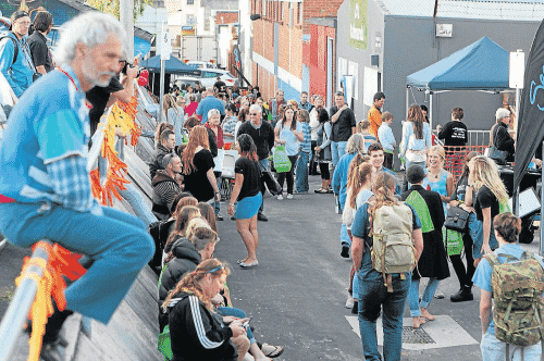 ATTRACTIONS: The scene for the Reclaim the Lane Youth Music and Arts Festival in Rooke Lane, Devonport, yesterday. Picture: Meg Windram.